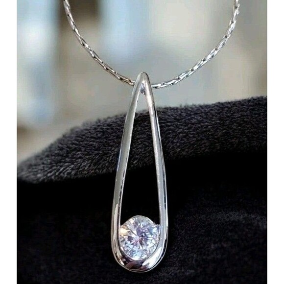 Cookie Lee Jewelry - Cookie Lee Silvertone Sparkling CZ Modern Drop Pendant Necklace Reflective Chain